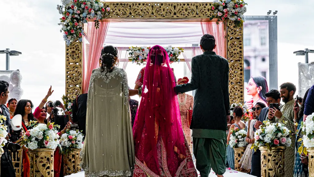 Indian bride walking down the isle at her wedding at the MGM Grand at National Harbor in Oxon Hill, Maryland.